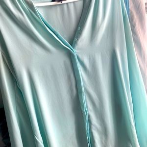 Turquoise blouse by Le Château